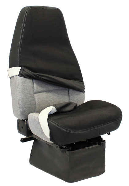 Ultra Seat semi truck seat cover being put on a seat.